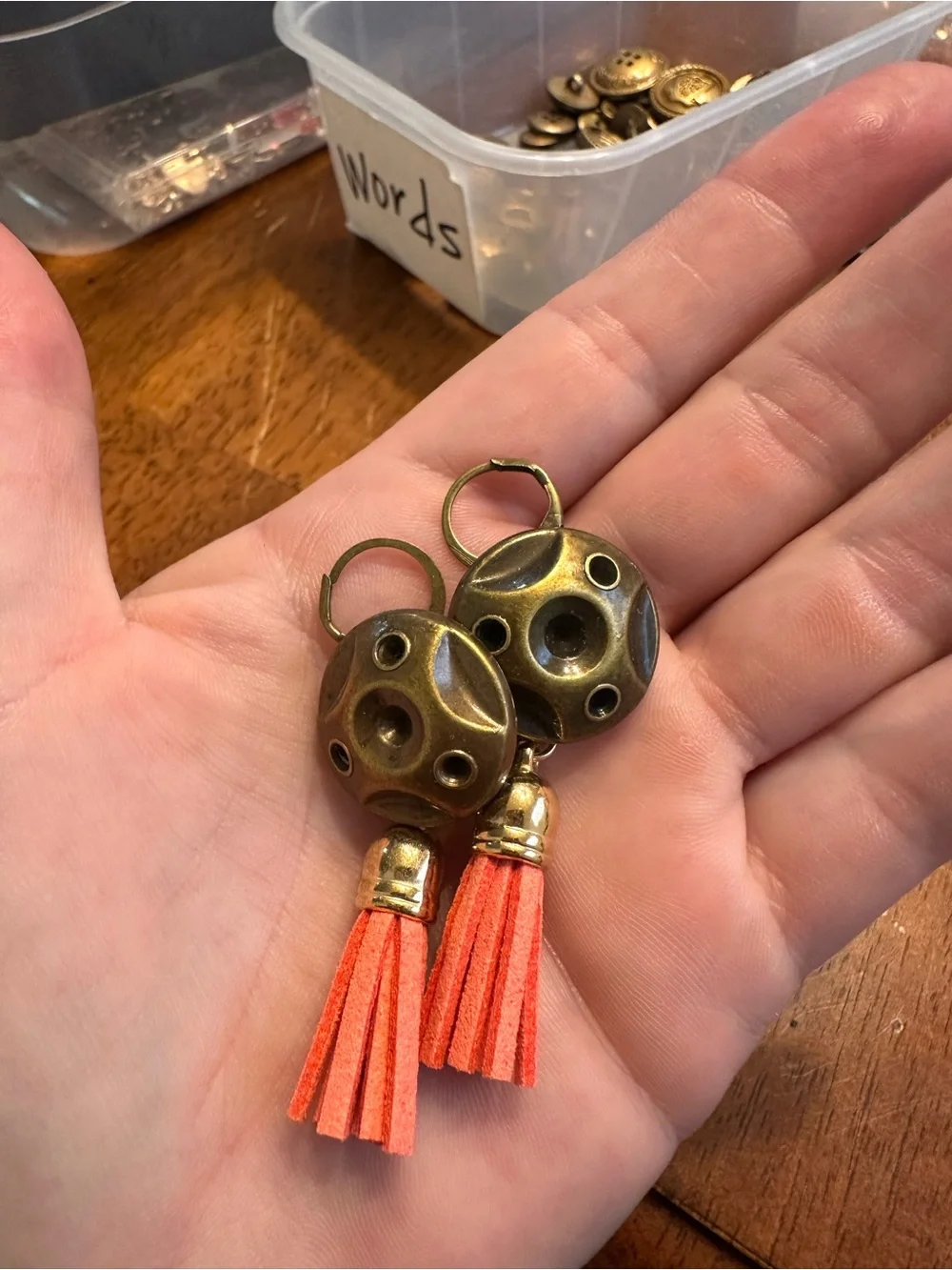Vintage-Inspired Brass Orb Earrings with Orange Tassels